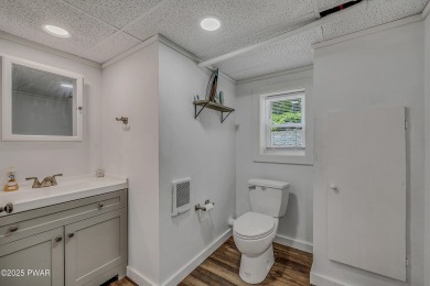 Enjoy the good life in Tanglwood Lakes at Lake Wallenpaupack on Paupack Hills Golf and Country Club in Pennsylvania - for sale on GolfHomes.com, golf home, golf lot