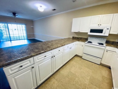 Welcome to this charming first-floor condo located in the heart on Myrtlewood Golf Course and Club  in South Carolina - for sale on GolfHomes.com, golf home, golf lot