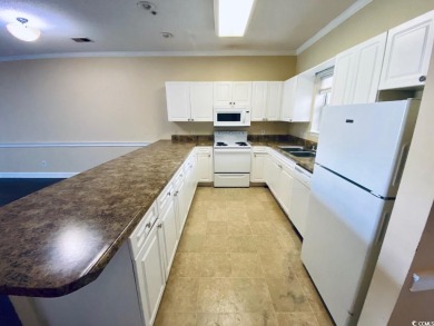 Welcome to this charming first-floor condo located in the heart on Myrtlewood Golf Course and Club  in South Carolina - for sale on GolfHomes.com, golf home, golf lot
