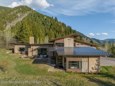 This is quintessential mountain contemporary living at the Snake on Snake River Sporting Club in Wyoming - for sale on GolfHomes.com, golf home, golf lot