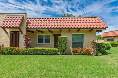 Ready to swap high-maintenance for high-enjoyment? This on The Dunedin Country Club in Florida - for sale on GolfHomes.com, golf home, golf lot