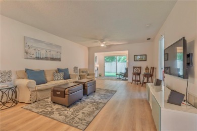 Ready to swap high-maintenance for high-enjoyment? This on The Dunedin Country Club in Florida - for sale on GolfHomes.com, golf home, golf lot