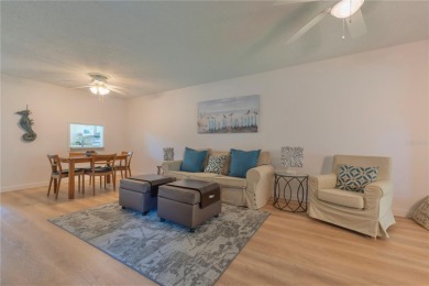 Ready to swap high-maintenance for high-enjoyment? This on The Dunedin Country Club in Florida - for sale on GolfHomes.com, golf home, golf lot