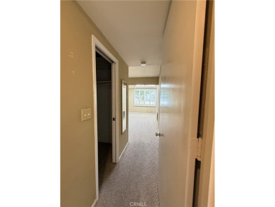 This is a fully expanded unit (approx 1200 sq ft) with two on Leisure World Seal Beach Golf Course in California - for sale on GolfHomes.com, golf home, golf lot