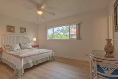 Ready to swap high-maintenance for high-enjoyment? This on The Dunedin Country Club in Florida - for sale on GolfHomes.com, golf home, golf lot