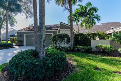 Enjoy serene lake views from this beautiful villa in the on Wyndemere Country Club in Florida - for sale on GolfHomes.com, golf home, golf lot