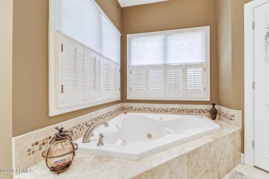 Welcome to this beautifully maintained 4-bedroom, 4-bathroom on Long Cove Club in South Carolina - for sale on GolfHomes.com, golf home, golf lot