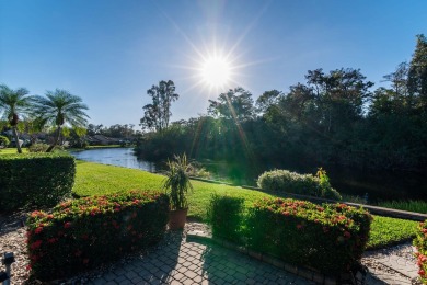 Enjoy serene lake views from this beautiful villa in the on Wyndemere Country Club in Florida - for sale on GolfHomes.com, golf home, golf lot