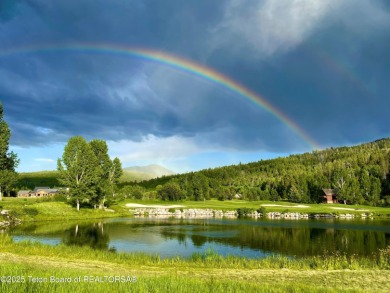 Welcome to your dream oasis nestled within the prestigious Teton on Teton Springs Resort and Club in Idaho - for sale on GolfHomes.com, golf home, golf lot