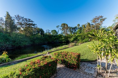 Enjoy serene lake views from this beautiful villa in the on Wyndemere Country Club in Florida - for sale on GolfHomes.com, golf home, golf lot