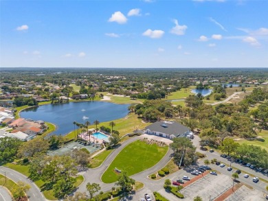 Welcome to your dream home in the sought-after GlenLakes Golf on Glen Lakes Country Club in Florida - for sale on GolfHomes.com, golf home, golf lot