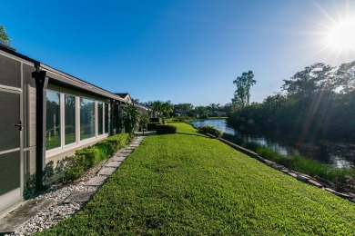 Enjoy serene lake views from this beautiful villa in the on Wyndemere Country Club in Florida - for sale on GolfHomes.com, golf home, golf lot