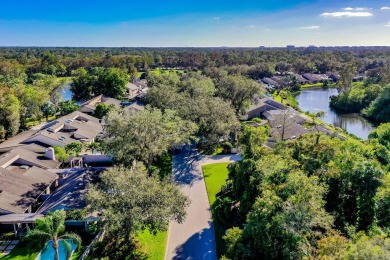 Enjoy serene lake views from this beautiful villa in the on Wyndemere Country Club in Florida - for sale on GolfHomes.com, golf home, golf lot