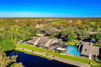 Enjoy serene lake views from this beautiful villa in the on Wyndemere Country Club in Florida - for sale on GolfHomes.com, golf home, golf lot