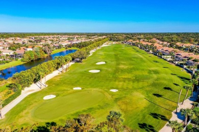 Enjoy serene lake views from this beautiful villa in the on Wyndemere Country Club in Florida - for sale on GolfHomes.com, golf home, golf lot