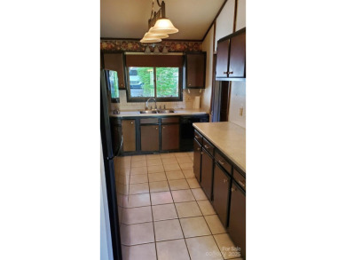 Enjoy easy living in this well-maintained, low-maintenance condo on Glen Cannon Country Club in North Carolina - for sale on GolfHomes.com, golf home, golf lot