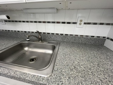 True corner ground floor end unit Burgundy 'F' bldg. Park right on Kings Point Golf -Flanders Way in Florida - for sale on GolfHomes.com, golf home, golf lot