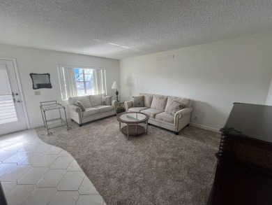True corner ground floor end unit Burgundy 'F' bldg. Park right on Kings Point Golf -Flanders Way in Florida - for sale on GolfHomes.com, golf home, golf lot