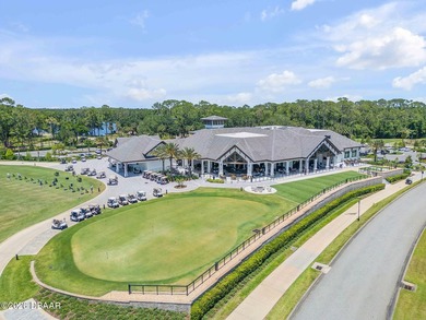 Experience modern Florida living in this stunning two-story home on Plantation Bay Golf and Country Club in Florida - for sale on GolfHomes.com, golf home, golf lot