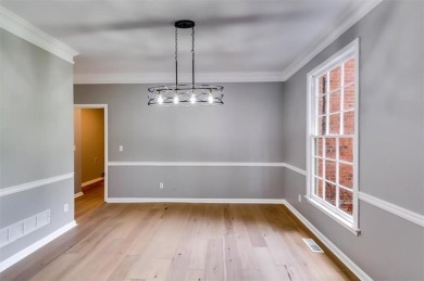 Embrace luxury living at its finest in this fully renovated on Canongate At Olde Atlanta Golf Club in Georgia - for sale on GolfHomes.com, golf home, golf lot