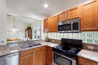 Very nice pool home that is waterfront located in in Ridgewood on Ridgewood Lakes Golf and Country Club in Florida - for sale on GolfHomes.com, golf home, golf lot
