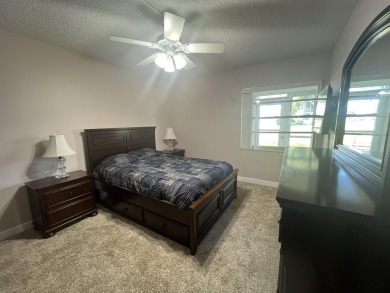 True corner ground floor end unit Burgundy 'F' bldg. Park right on Kings Point Golf -Flanders Way in Florida - for sale on GolfHomes.com, golf home, golf lot