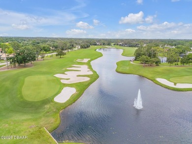 Experience modern Florida living in this stunning two-story home on Plantation Bay Golf and Country Club in Florida - for sale on GolfHomes.com, golf home, golf lot
