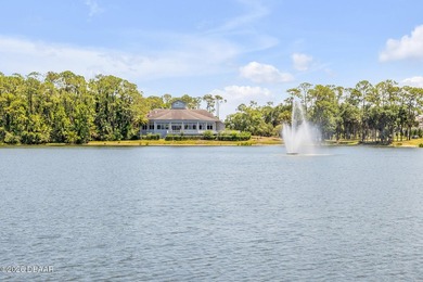 Experience modern Florida living in this stunning two-story home on Plantation Bay Golf and Country Club in Florida - for sale on GolfHomes.com, golf home, golf lot