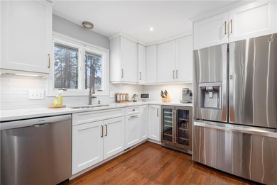 Set in the heart of Warwick Neck, this thoughtfully reimagined on Warwick Country Club in Rhode Island - for sale on GolfHomes.com, golf home, golf lot