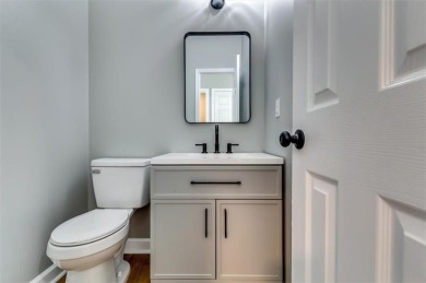 Embrace luxury living at its finest in this fully renovated on Canongate At Olde Atlanta Golf Club in Georgia - for sale on GolfHomes.com, golf home, golf lot