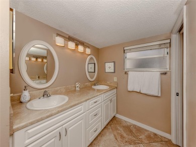 This first floor condo sits steps away from the community pool on Plantation Golf and Country Club in Florida - for sale on GolfHomes.com, golf home, golf lot