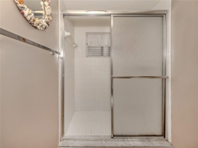 This first floor condo sits steps away from the community pool on Plantation Golf and Country Club in Florida - for sale on GolfHomes.com, golf home, golf lot