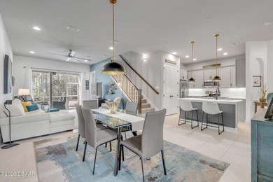 Experience modern Florida living in this stunning two-story home on Plantation Bay Golf and Country Club in Florida - for sale on GolfHomes.com, golf home, golf lot