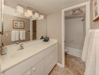 This first floor condo sits steps away from the community pool on Plantation Golf and Country Club in Florida - for sale on GolfHomes.com, golf home, golf lot