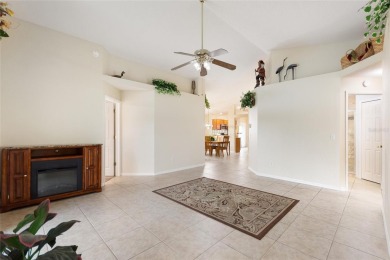 Very nice pool home that is waterfront located in in Ridgewood on Ridgewood Lakes Golf and Country Club in Florida - for sale on GolfHomes.com, golf home, golf lot