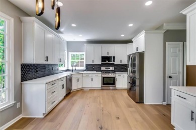 Embrace luxury living at its finest in this fully renovated on Canongate At Olde Atlanta Golf Club in Georgia - for sale on GolfHomes.com, golf home, golf lot