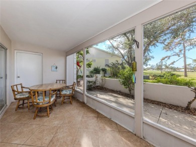 This first floor condo sits steps away from the community pool on Plantation Golf and Country Club in Florida - for sale on GolfHomes.com, golf home, golf lot