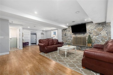 Set in the heart of Warwick Neck, this thoughtfully reimagined on Warwick Country Club in Rhode Island - for sale on GolfHomes.com, golf home, golf lot