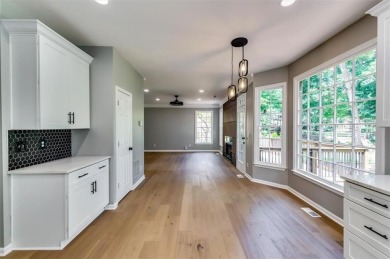 Embrace luxury living at its finest in this fully renovated on Canongate At Olde Atlanta Golf Club in Georgia - for sale on GolfHomes.com, golf home, golf lot