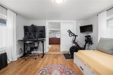 Set in the heart of Warwick Neck, this thoughtfully reimagined on Warwick Country Club in Rhode Island - for sale on GolfHomes.com, golf home, golf lot