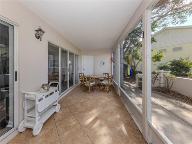 This first floor condo sits steps away from the community pool on Plantation Golf and Country Club in Florida - for sale on GolfHomes.com, golf home, golf lot