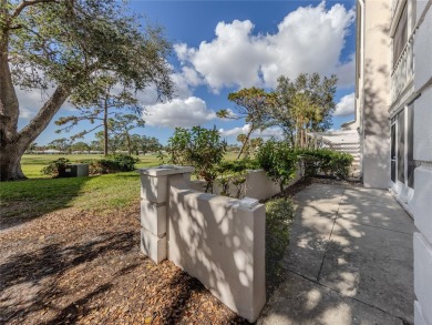 This first floor condo sits steps away from the community pool on Plantation Golf and Country Club in Florida - for sale on GolfHomes.com, golf home, golf lot