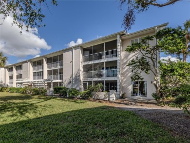 This first floor condo sits steps away from the community pool on Plantation Golf and Country Club in Florida - for sale on GolfHomes.com, golf home, golf lot