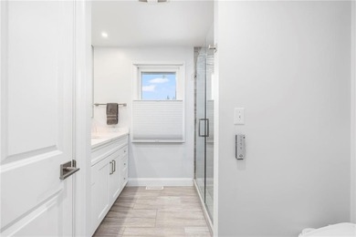 Set in the heart of Warwick Neck, this thoughtfully reimagined on Warwick Country Club in Rhode Island - for sale on GolfHomes.com, golf home, golf lot