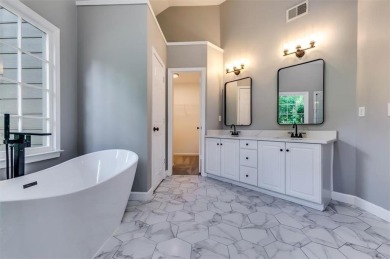 Embrace luxury living at its finest in this fully renovated on Canongate At Olde Atlanta Golf Club in Georgia - for sale on GolfHomes.com, golf home, golf lot