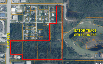 ATTENTION DEVELOPERS!  ALMOST 14 ACRES ON US HWY 1 RUNNING EAST on Gator Trace Golf & Country Club in Florida - for sale on GolfHomes.com, golf home, golf lot