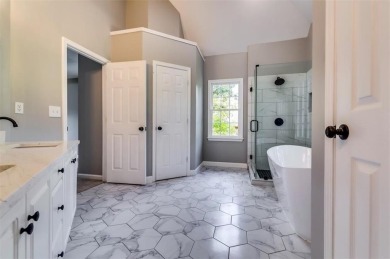 Embrace luxury living at its finest in this fully renovated on Canongate At Olde Atlanta Golf Club in Georgia - for sale on GolfHomes.com, golf home, golf lot