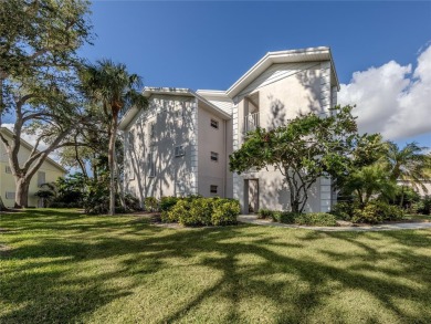 This first floor condo sits steps away from the community pool on Plantation Golf and Country Club in Florida - for sale on GolfHomes.com, golf home, golf lot