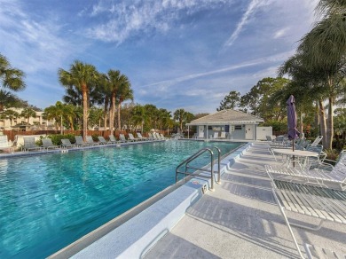 This first floor condo sits steps away from the community pool on Plantation Golf and Country Club in Florida - for sale on GolfHomes.com, golf home, golf lot
