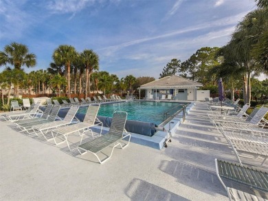 This first floor condo sits steps away from the community pool on Plantation Golf and Country Club in Florida - for sale on GolfHomes.com, golf home, golf lot